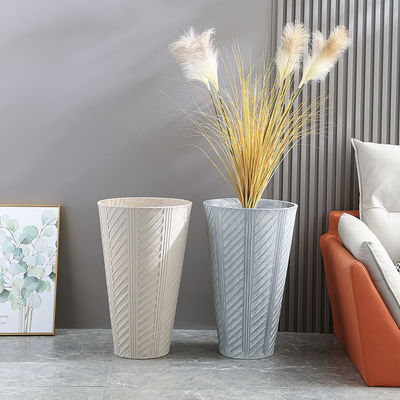 Chick Fiber Clay Planter nâng cao màn hình cây trồng của bạn với thiết kế tối giản
